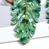 Daphne Acrylic Fern Frond Earrings - Large green earrings made to resemble the fronds of a fern, formed from marbled green acrylic.