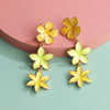 Laka Hibiscus Flower Drop Earrings - Long enamel earrings with three flowers painted in different complimentary shades of enamel paint.