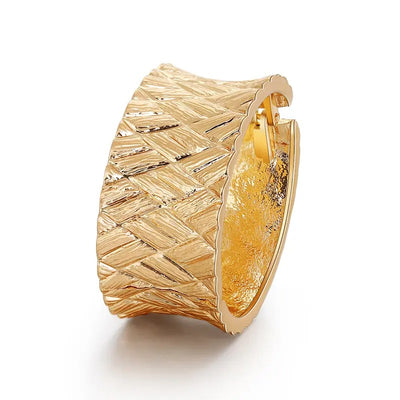 Phaedra Hinged Cuff Bangle - A beautiful gold cuff bangle with a basket weave pattern.