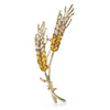 Cailleach Grain Sheath Brooch - An elegant crystal brooch shaped like a pair of wheat stalks bound by a delicate thread.