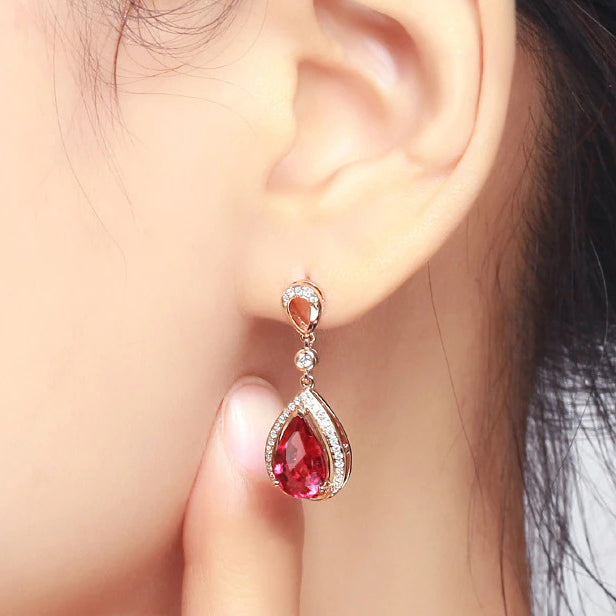 Elise Luxury Crystal Dangle Earrings - Gorgeous, high-class vintage-style drop earrings with a large pear-shaped red topaz surrounded by tiny quartz crystals. 