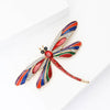 Aethera Dragonfly Brooch - A large, colourful dragonfly themed brooch with vibrant enamel paint and sparkling crystals.