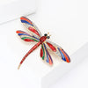 Aethera Dragonfly Brooch - A large, colourful dragonfly themed brooch with vibrant enamel paint and sparkling crystals.