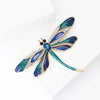 Aethera Dragonfly Brooch - A large, colourful dragonfly themed brooch with vibrant enamel paint and sparkling crystals.