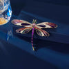 Aethera Dragonfly Brooch - A large, colourful dragonfly themed brooch with vibrant enamel paint and sparkling crystals.