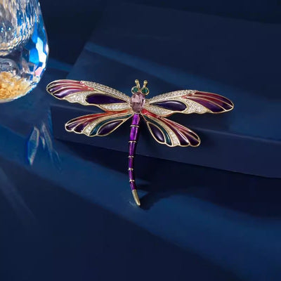 Aethera Dragonfly Brooch - A large, colourful dragonfly themed brooch with vibrant enamel paint and sparkling crystals.