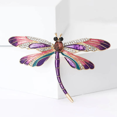 Aethera Dragonfly Brooch - A large, colourful dragonfly themed brooch with vibrant enamel paint and sparkling crystals.