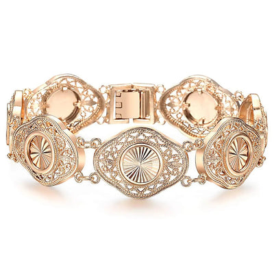 Alessandra Cut-Out Link Bracelet - An elegant rose gold bracelet made up of seven stylised eye-shaped panels linked with chain links.