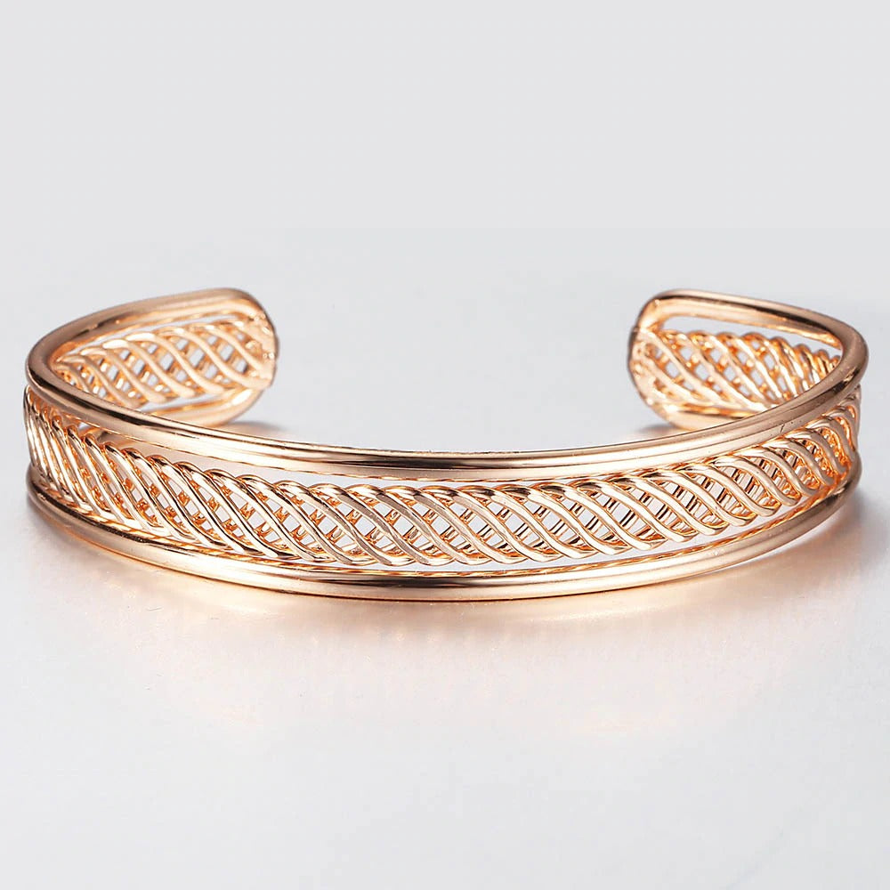 Alicia Woven Cuff Bracelet - A beautiful rose gold bangle that looks like it's made out of plaited or braided strands of gold. 