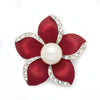 Amara Enamel Anemone Brooch - A lovely floral brooch featuring five coloured enamel petals clustered around a central pearl, each petal edged along one wide with small quartz crystals.