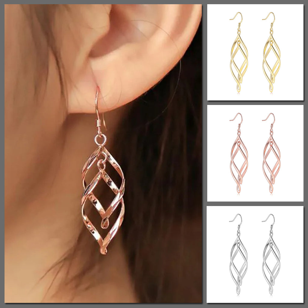 Amita Infinite Twist Dangle Earrings - Medium-sized elegant spiral twist earrings in yellow, rose, or white gold. 