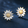 Annette Crystal Daisy Stud Earrings - Small round crystal earrings made to resemble cute little stylised sunflowers, with a pitted metal centre surrounded by crystal petals.