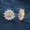 Annette Crystal Daisy Stud Earrings - Small round crystal earrings made to resemble cute little stylised sunflowers, with a pitted metal centre surrounded by crystal petals.