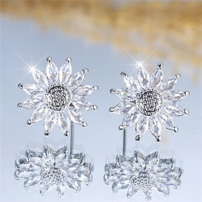 Annette Crystal Daisy Stud Earrings - Small round crystal earrings made to resemble cute little stylised sunflowers, with a pitted metal centre surrounded by crystal petals.