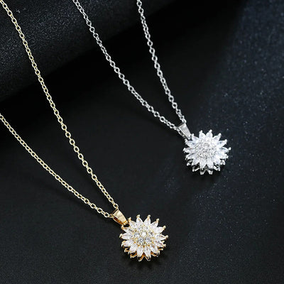 Annie Sunflower Fidget Spinner Necklace - A tiny round crystal pendant designed to look like a stylised sunflower, which features a rotating plate so it can be twirled for a calming meditative effect.