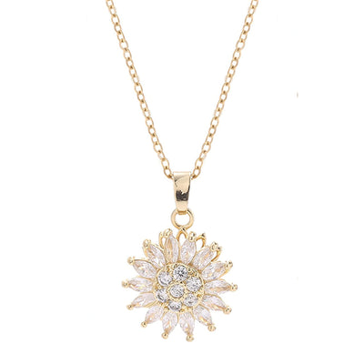 Annie Sunflower Fidget Spinner Necklace - A tiny round crystal pendant designed to look like a stylised sunflower, which features a rotating plate so it can be twirled for a calming meditative effect.