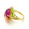 The Anthousai Ring - A lovely vibrant floral ring with a large coloured crystal surrounded by tiny enamel flowers and leaves.