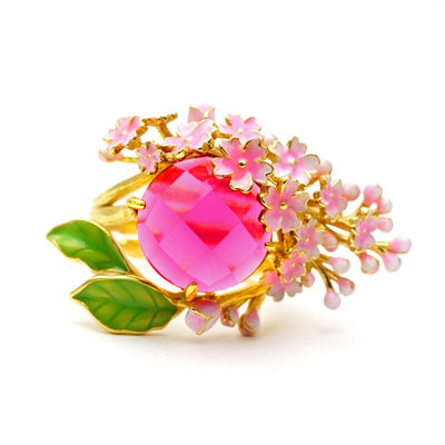 The Anthousai Ring - A lovely vibrant floral ring with a large coloured crystal surrounded by tiny enamel flowers and leaves.