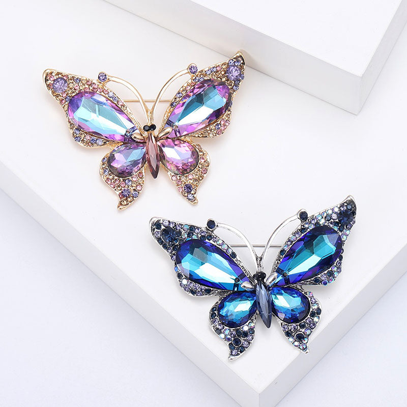 Anya Oversized Butterfly Brooch - A very large butterfly shaped brooch encrusted with lovely, shimmering crystals, available in purple or blue. 