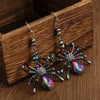 Arachne Iridescent Spider Dangle Earrings - Long, dangly French hook earrings with a colourful spider charm on the end.