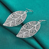 Aranyani Stylised Leaf Earrings - A pair of beautiful, sterling silver plated leaf charms suspended from french hooks.