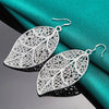 Aranyani Stylised Leaf Earrings - A pair of beautiful, sterling silver plated leaf charms suspended from french hooks.