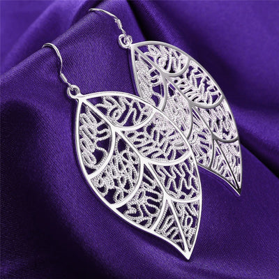 Aranyani Stylised Leaf Earrings - A pair of beautiful, sterling silver plated leaf charms suspended from french hooks.