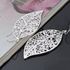 Aranyani Stylised Leaf Earrings - A pair of beautiful, sterling silver plated leaf charms suspended from french hooks.