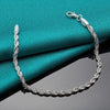 Aria Silver Spiral Chain Bracelet - A delicate spiral chain bracelet made from bright, vibrant silver.