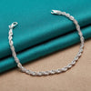 Aria Silver Spiral Chain Bracelet - A delicate spiral chain bracelet made from bright, vibrant silver.