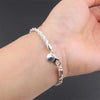 Aria Silver Spiral Chain Bracelet - A delicate spiral chain bracelet made from bright, vibrant silver.