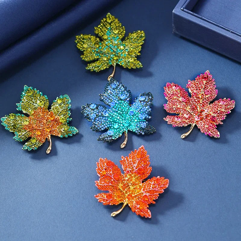 Aurelia II Maple Leaf Crystal Brooch - A large brooch shaped like a stylised maple leaf, encrusted with colourful pave-style crystals in five different colour palettes.