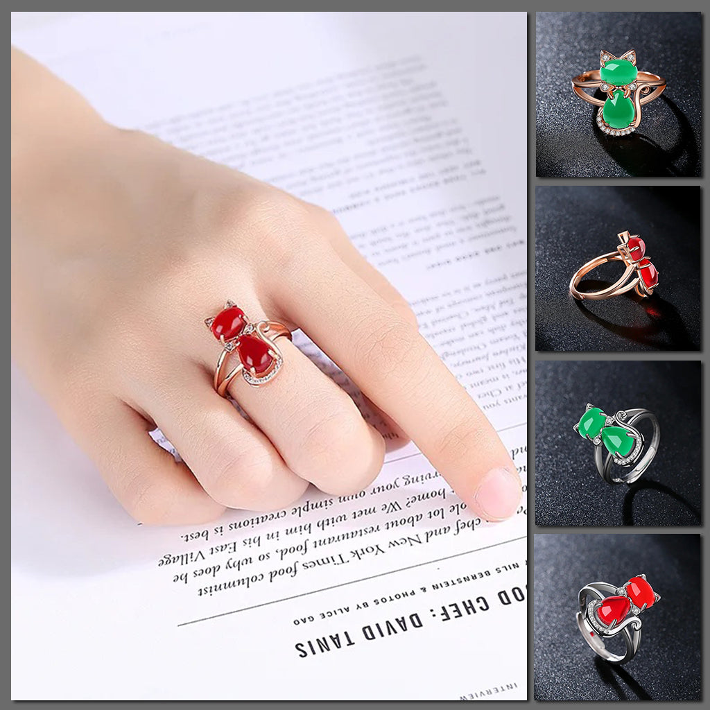 Bastet II Adjustable Ring - A stylish cat-themed ring composed of two large artificial opals framed by tiny quartz crystals, available in red or green.