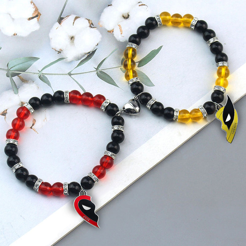 Cheeky Geek Best Bubs Magnetic Friendship Bracelet Set - A pair of stretch bangles made from colourful glass beads and charms inspired by Marvel's Deadpool & Wolverine.