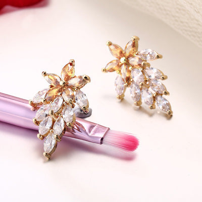 Bijoux Astraea Earrings - Adorable small stud earrings with a floral motif, adorned with sparkling crystals.