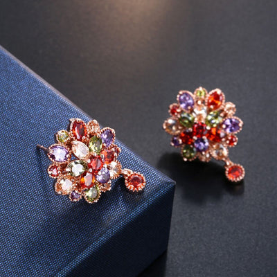 Bijoux Kaleidoscope Cluster Earrings - A medium-sized round cluster earring made of lots of smaller stones clustered around a centre stone, to resemble a flower or starburst.