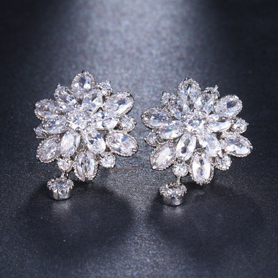 Bijoux Kaleidoscope Cluster Earrings - A medium-sized round cluster earring made of lots of smaller stones clustered around a centre stone, to resemble a flower or starburst.