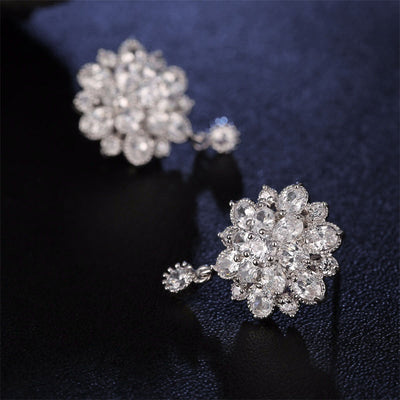 Bijoux Kaleidoscope Cluster Earrings - A medium-sized round cluster earring made of lots of smaller stones clustered around a centre stone, to resemble a flower or starburst.