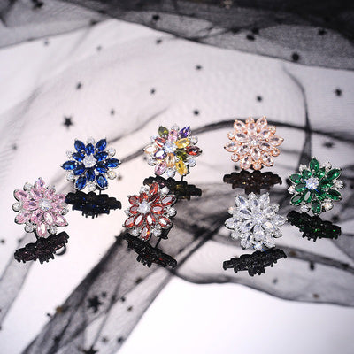Bijoux Kaleidoscope Cluster Earrings - A medium-sized round cluster earring made of lots of smaller stones clustered around a centre stone, to resemble a flower or starburst.
