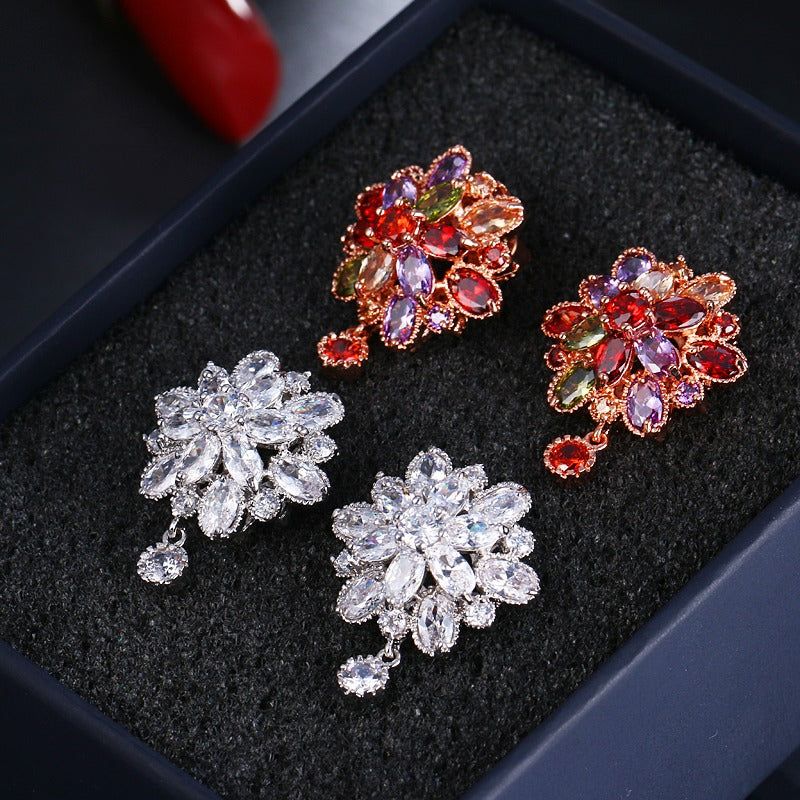 Bijoux Kaleidoscope Cluster Earrings - A medium-sized round cluster earring made of lots of smaller stones clustered around a centre stone, to resemble a flower or starburst.