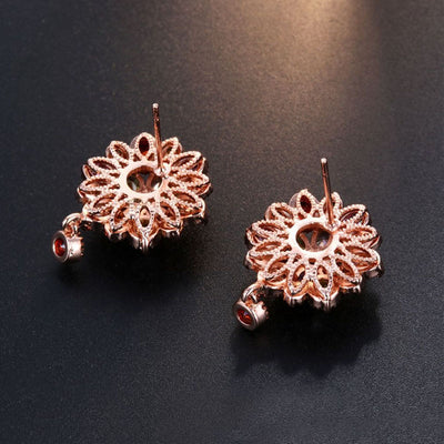 Bijoux Kaleidoscope Cluster Earrings - A medium-sized round cluster earring made of lots of smaller stones clustered around a centre stone, to resemble a flower or starburst.