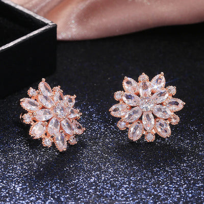 Bijoux Kaleidoscope Cluster Earrings - A medium-sized round cluster earring made of lots of smaller stones clustered around a centre stone, to resemble a flower or starburst.