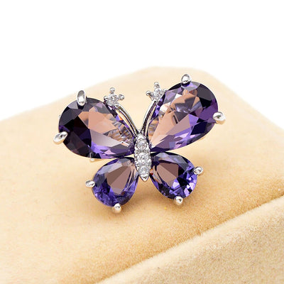 Bijoux Single Butterfly Brooch - A tiny, delicate little butterfly brooch made of shiny crystals.