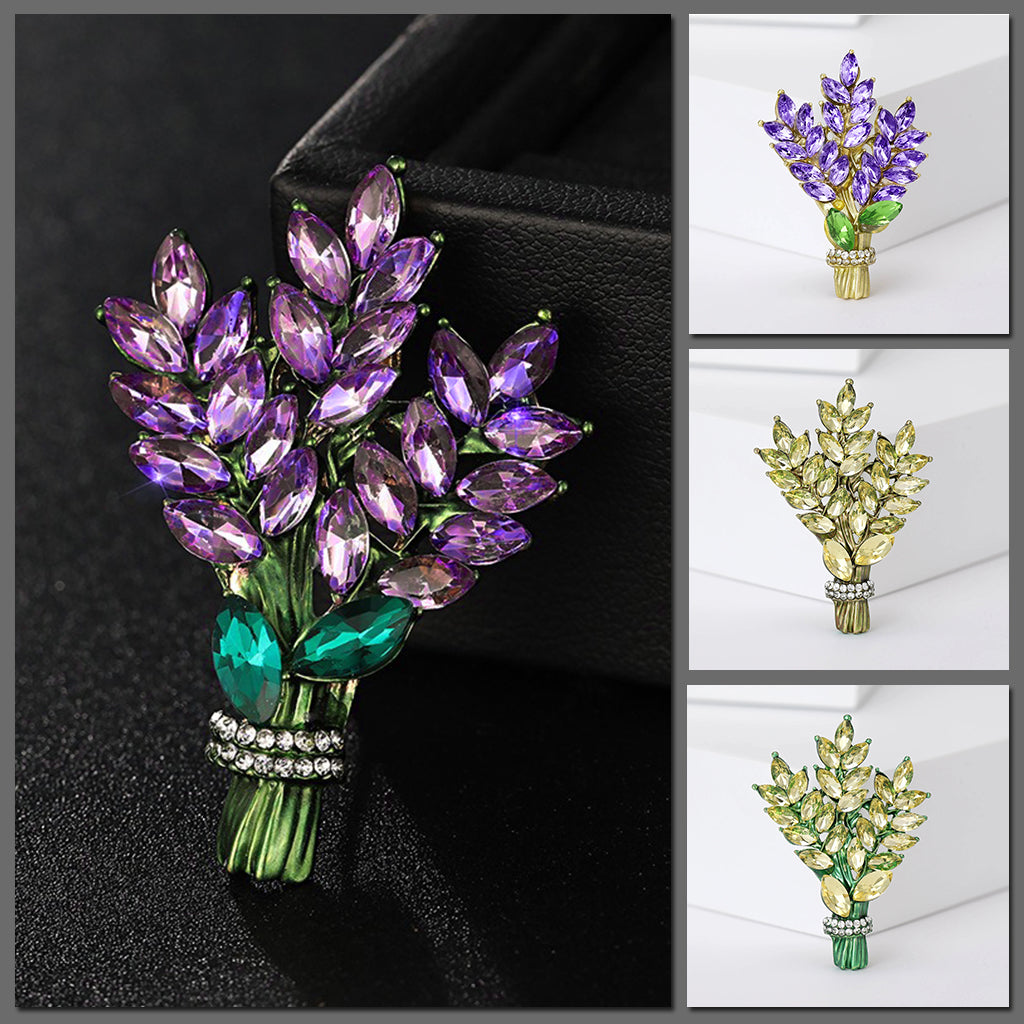 Brighid Lavender Sprig Brooch - A medium-sized crystal brooch shaped like a trio of delicate sprigs of lavender tied together, featuring lovely purple, green, and white crystals.