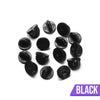 Loose Brooch Pin Backs - A pile of rubber brooch backs in black.