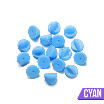 Loose Brooch Pin Backs - A pile of rubber brooch backs in cyan.
