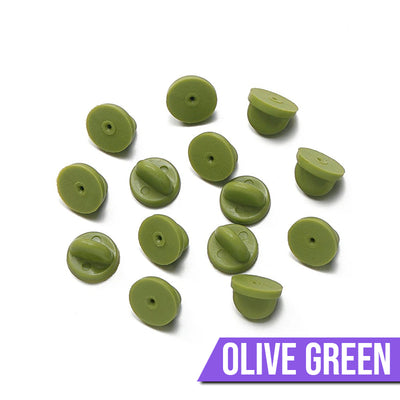 Loose Brooch Pin Backs - A pile of rubber brooch backs in olive green.