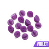 Loose Brooch Pin Backs - A pile of rubber brooch backs in violet.
