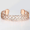 Celeste Woven Cuff Bracelet - A beautiful simple rose gold cuff that looks like plaited strands of wire.