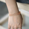 Celeste Woven Cuff Bracelet - A beautiful simple rose gold cuff that looks like plaited strands of wire.